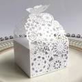 White laser-cut butterfly wedding favor box with intricate floral pattern on paper - White