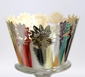 Macro detail of laser-cut silver sunflower cupcake wrapper for wedding party decor - Reflective Silver