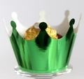 Macro shot of metallic green crown cupcake wrappers with reflective finish and chocolate - Reflective Green