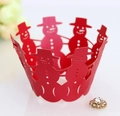 Detail of laser-cut red cupcake wrapper with Christmas snowman patterns on pearlescent paper - Pearlescent Red