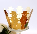 Intricate hollow golden cupcake wrapper featuring a festive snowman with top hat design - Reflective Gold