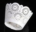 Macro detail of white laser-cut cupcake wrappers with floral sunflower hollow pattern - 5*5*8CM / White