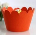 Dettaglio del pirottino per cupcake arancione con bordo ondulato e finitura opaca - 5*5*8CM / Rosso Arancio