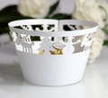 Laser-cut white cupcake wrapper with reindeer and snowman hollow patterns for Christmas - White