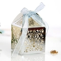 Detailed laser-cut pattern on silver wedding favor box with a light blue silk ribbon - Reflective Silver