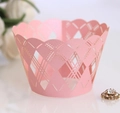 Close-up of pink laser-cut cupcake wrapper with diamond pattern and scalloped edges - 5cm / Pink