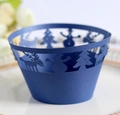 Detailed laser-cut blue Christmas cupcake wrapper with reindeer and snowflake patterns - Sapphire Blue