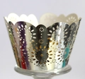 Macro detail of laser-cut silver cupcake wrapper with elegant floral hollow patterns - Reflective Silver