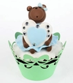 Detail of laser-cut cupcake wrapper with bow pattern and cute brown bear topper - Fruit Green