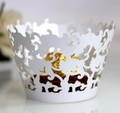 Elegant white laser-cut cupcake wrappers with floral vine lace pattern for wedding decor - White