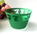 Green laser-cut Christmas cupcake wrappers with reindeer, snowman and tree designs - Dark Green