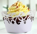Detail showing white laser-cut hollow star lace cupcake wrapper on red velvet cake - Light Purple