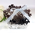 Detailed macro view of laser-cut floral patterns on silver wedding favor gift box - Reflective Silver