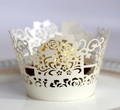 Elegant white laser-cut rose floral cupcake wrapper on white ceramic plate - Ivory