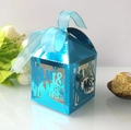Detail of laser-cut Mr & Mrs blue wedding candy box with elegant ribbon and mirror finish - Reflective Blue