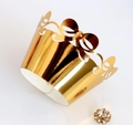 Detailed laser-cut gold cupcake wrapper with bow patterns and mirror foil finish - Reflective Gold