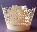 Intricate laser-cut cream cupcake wrapper with elegant floral hollow-out pattern - Jade Pearl