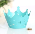 Cyan laser-cut crown cake wrappers with star and heart patterns on white mirror - Tiffany Blue