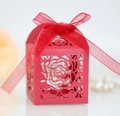 Red laser-cut wedding favor box with hollow rose patterns and red ribbon bow decoration - Pearlescent Red