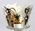 Macro shot of laser-cut gold butterfly cupcake wrappers with metallic mirror finish - Reflective Silver