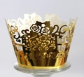 Detailed laser-cut golden cupcake wrapper featuring intricate floral and rose patterns - Reflective Gold