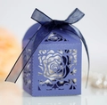 Detail of purple laser-cut rose wedding candy box with a navy blue ribbon bow decoration - Sapphire Blue