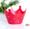 Detail of red crown cupcake wrapper with laser-cut star patterns and glitter finish - Pearlescent Red