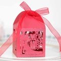 Red laser-cut wedding candy box featuring Mr & Mrs silhouettes and a matching ribbon - Red