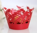 Macro detail of red laser-cut cupcake wrapper with intricate leaf and bird patterns - 5cm / Pearlescent Red