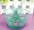 Detail of laser-cut dark green Christmas tree cupcake wrappers for holiday baking decoration - Dark Green