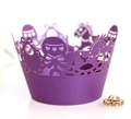 Detail of purple laser-cut cupcake wrappers with hollow carousel and heart patterns - Dark Purple