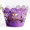 Macro shot of laser-cut purple cupcake wrapper with intricate mandala lace pattern detail - Dark Purple