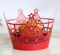 Red laser-cut Christmas tree cupcake wrappers with intricate hollow star patterns - Pearlescent Red