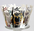Macro detail of laser cut owl cupcake wrapper with silver metallic finish and intricate pattern - Reflective Silver