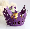 Detail of purple laser-cut cupcake wrapper with Merry Christmas snowman and tree motifs - 5cm / Dark Purple