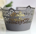 Macro detail of laser-cut crown cupcake wrapper in metallic dark grey finish - Silver Charcoal