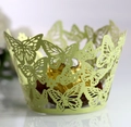 Laser-cut butterfly cupcake wrapper in light green with a subtle shimmer finish - 5cm / Light Green