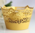 Elegant gold laser-cut cupcake wrappers with geometric crown design for party decor - Gold