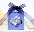 Detail of laser-cut heart and leaf pattern on a pearlescent purple wedding candy gift box - Sapphire Blue