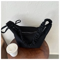 Minimalist black canvas shoulder bag with pleated strap and side bow decoration - Black