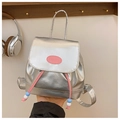Close-up of metallic silver mini backpack with pink drawstring and beaded charms - Standard / Silver