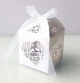 Close-up of laser-cut heart pattern gift box with white organza ribbon bow for weddings - White