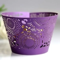 Purple laser-cut cupcake wrappers with sunburst patterns and golden inner layer - Deep purple