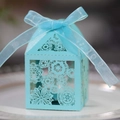 Sky blue laser cut favor box with intricate floral hollow design and ribbon bow - Tiffany Blue