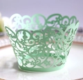 Detaillierte lasergemachte hellgrüne Cupcake-Hülle mit filigranen Blumenmustern - 5cm / Fruchtgrün