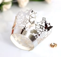 Elegant laser cut silver cupcake wrappers with butterfly floral patterns for weddings - Reflective Silver