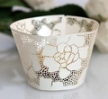 Macro shot of laser-cut rose hollow cupcake wrapper with pearlescent ivory paper finish - 5cm / Ivory