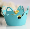 Detailed laser-cut sky blue crown paper cupcake wrapper with intricate hollow patterns - Turquoise Blue