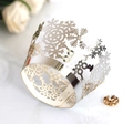 Elegant silver laser-cut snowflake cupcake wrappers for festive Christmas table decoration - Reflective Silver