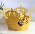 Macro detail of laser-cut crown pumpkin carriage paper holder for chocolates - Gold Yellow